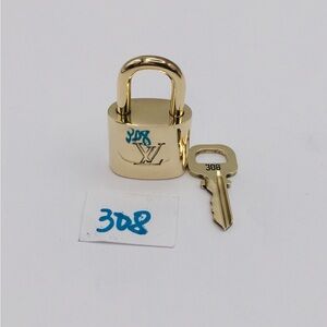 Authentic Louis Vuitton lock and key 308